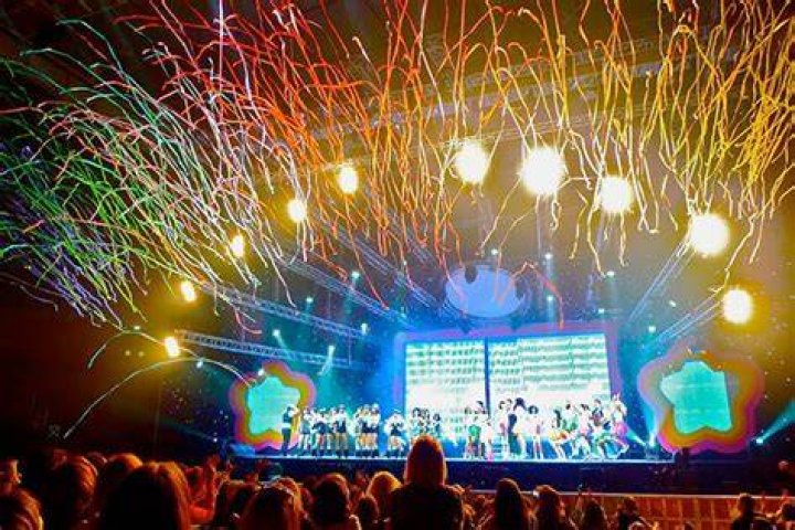 Confetti and streamers are fired off during a ribbon cutting... Photo