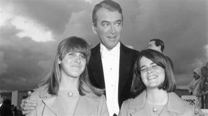 Jimmy Stewart with his twin daughters arriving at...