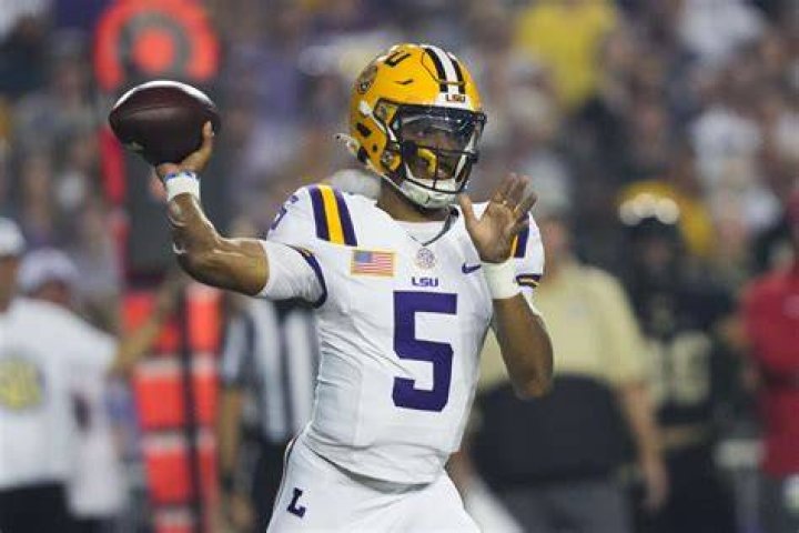 VIDEO LSU Quarterback Jayden Daniels Takes Brutal Hit From FSU's Tatum